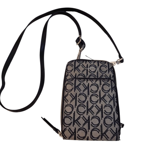 Calvin Klein Handbags - Calvin Klein Monogram Black and Cream Crossbody Bag